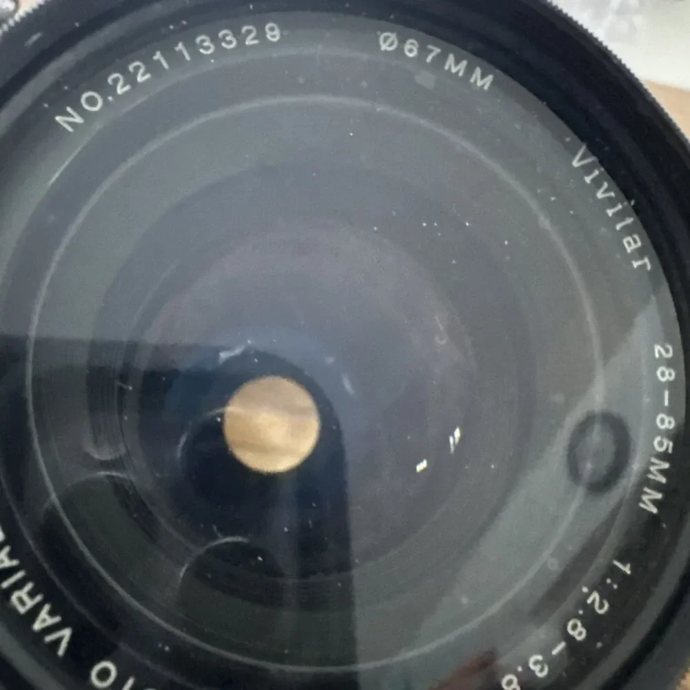 vintage Vivitar 28-85mm f/2.8-3.8 MC macro focusing camera lens.